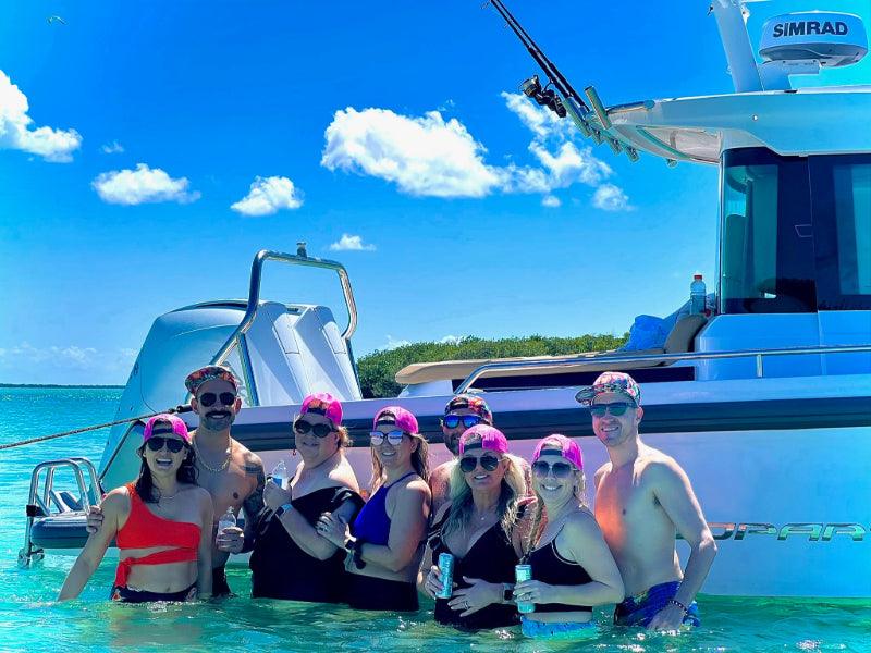pride party group on boat charter