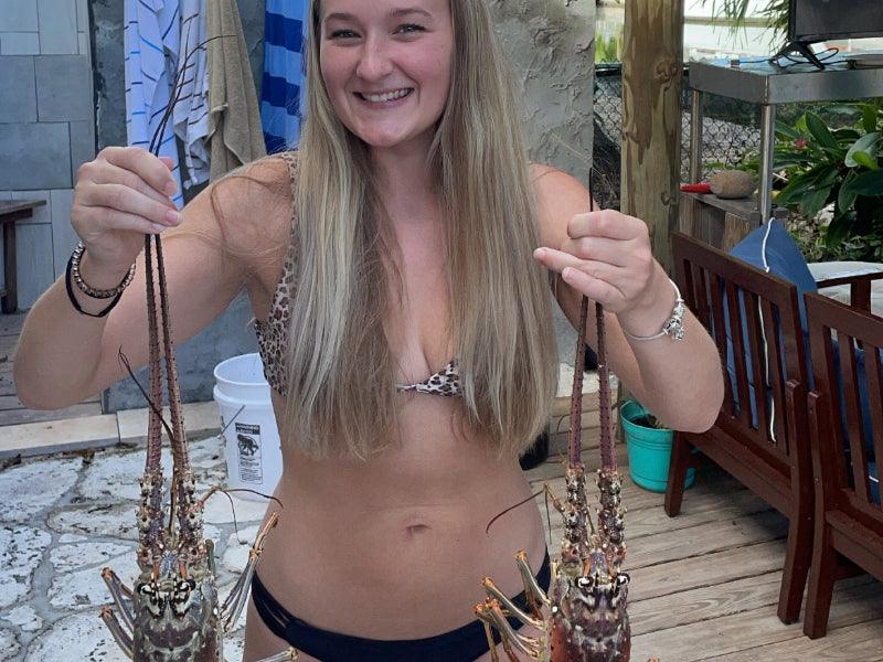 woman catching lobsters