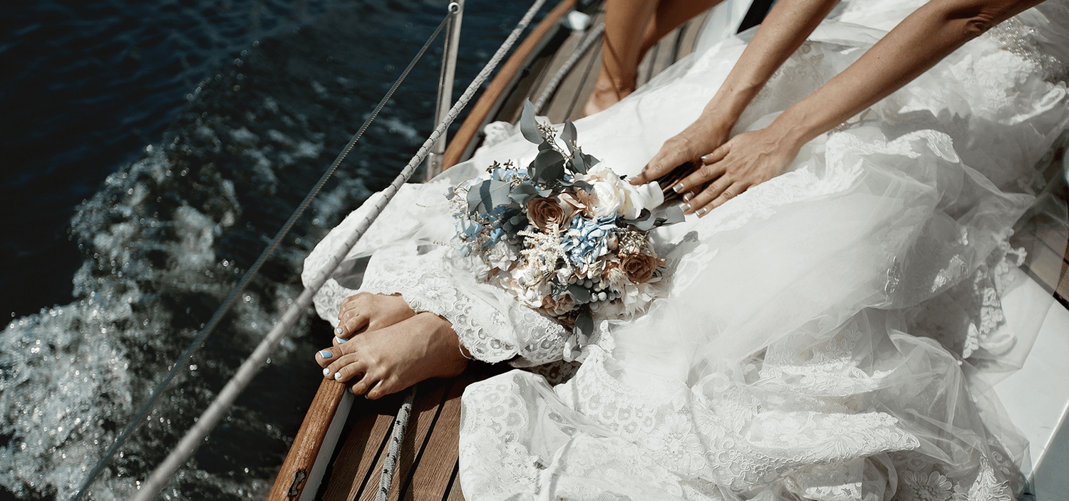 woman in wedding dress on boat charter