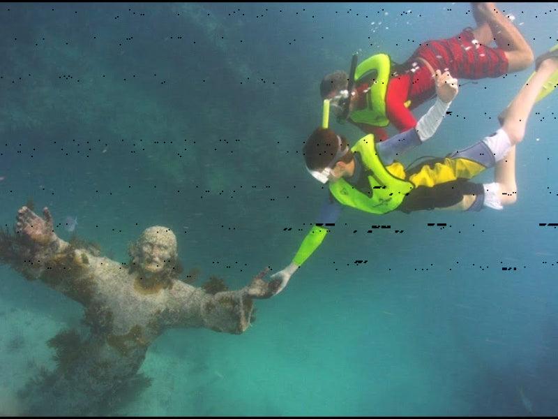 Christ of the abyss statue snorkeling tour
