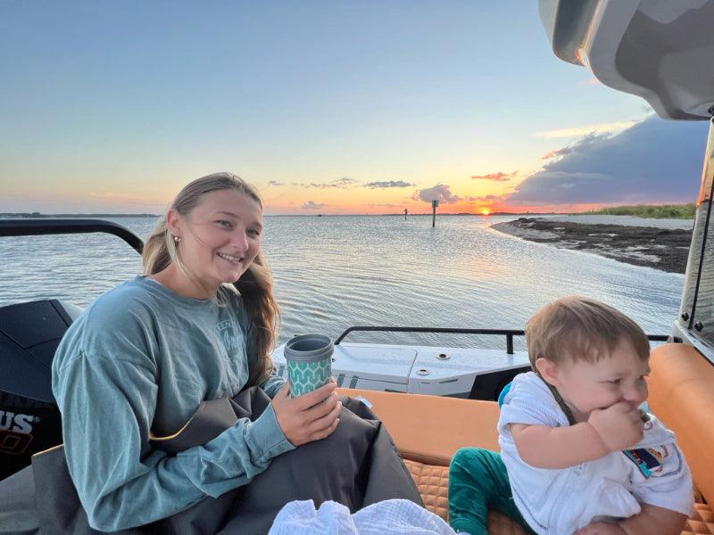 family having dinner for sunset tour boat charter