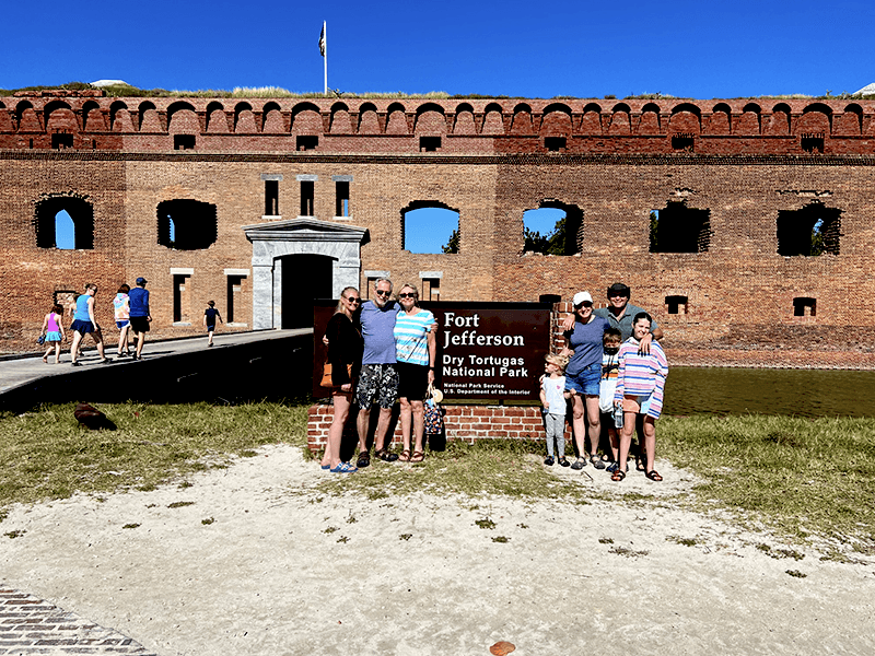family in front of Dry Tortugas National Park