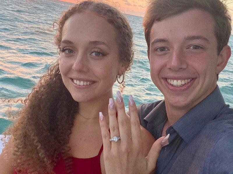 engaged couple on sunset tour boat charter