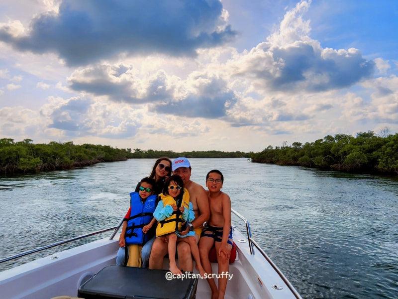 family on boat charter in Florida
