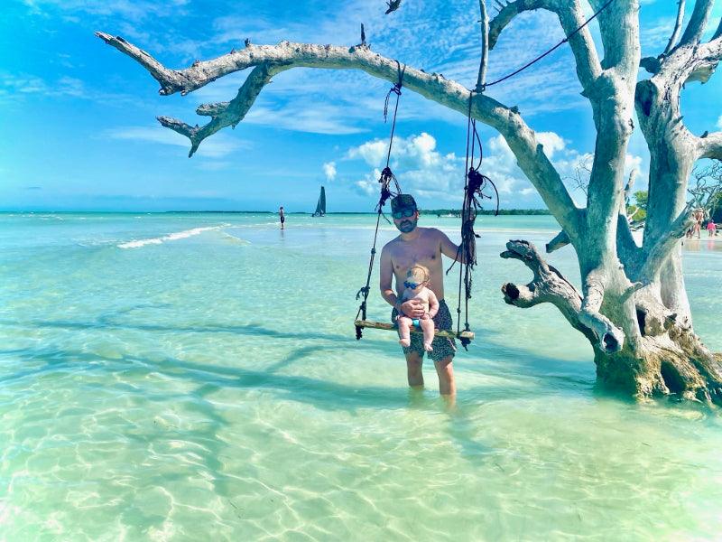 family on sandbar swing Florida Charters