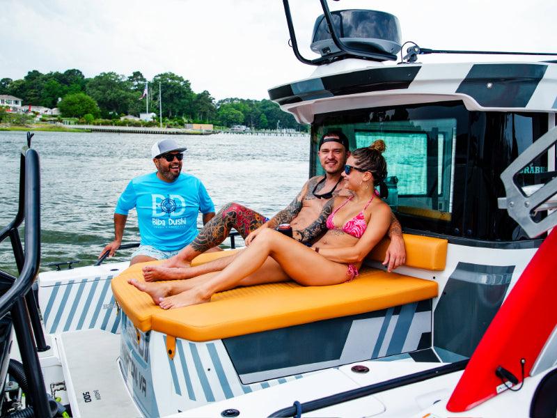 people lounging on charter boat