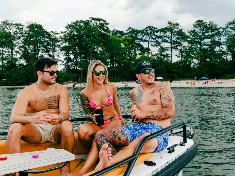 people lounging on axopar charter boat