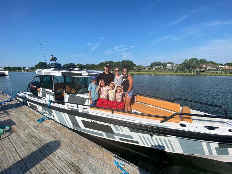 family on axopar charter boat