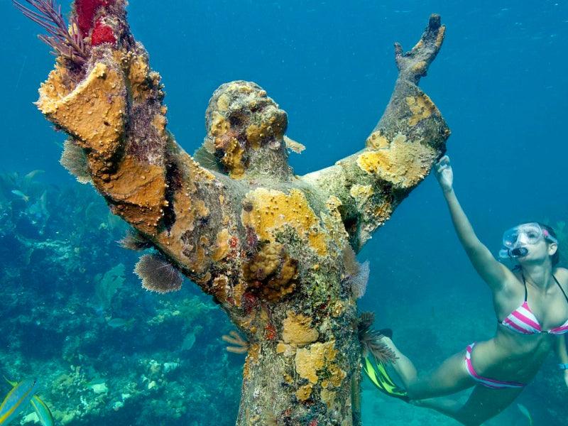 snorkel tour by Christ of the Abyss statue
