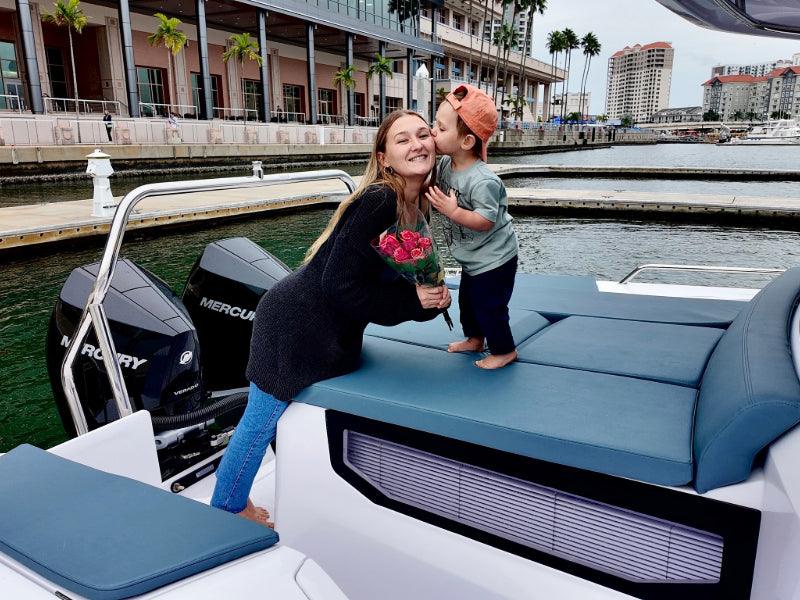 mother and son on charter boat