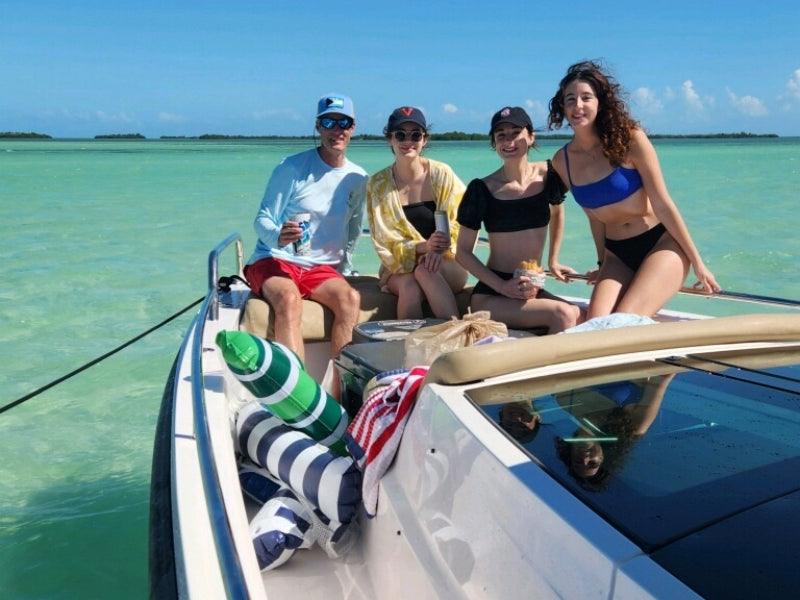 family on boat charter