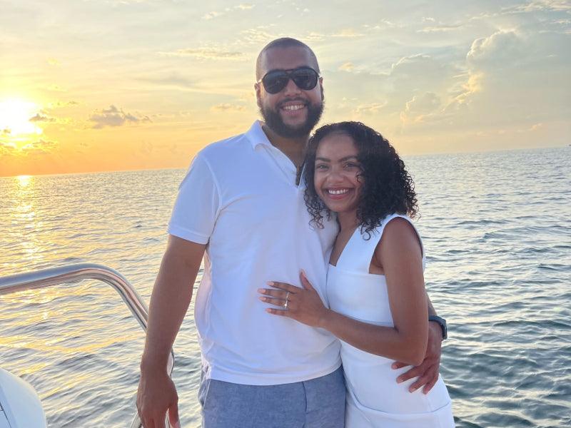 engaged couple on sunset tour boat charter